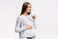 Pregnant Woman Drinking Milk Standing Over Gray Background Royalty Free Stock Photo