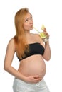 Pregnant woman drinking water with lemon juice Royalty Free Stock Photo