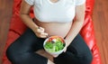 Pregnant woman eat vegetable salad, healthy food Royalty Free Stock Photo