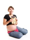 Pregnant woman eating chocolate Royalty Free Stock Photo