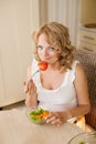 Pregnant woman eats vegetable salad Royalty Free Stock Photo