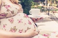 Pregnant woman enjoying cofee Royalty Free Stock Photo