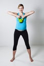 Pregnant woman exercising with kettlebell Royalty Free Stock Photo