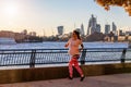 Pregnant woman exercising on the riverside in London Royalty Free Stock Photo