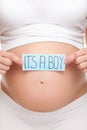 Pregnant woman expecting a baby boy Royalty Free Stock Photo