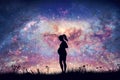 Pregnant woman expecting on night sky with nebula and stars.