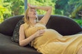 pregnant woman experiences a fainting spell, highlighting the challenges and vulnerabilities that can arise during