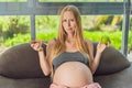 A pregnant woman faces a choice between nourishing, wholesome food and tempting fast food, highlighting the importance Royalty Free Stock Photo