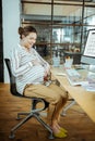 Pregnant woman feeling extremely excited before giving birth