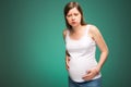 Pregnant woman feeling pain in the back and in the belly, contractions begin. Royalty Free Stock Photo