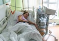 Pregnant woman feels hard contraction in a hospital labor delivery room. Concept photo of pregnancy, pregnant woman Royalty Free Stock Photo