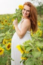 Pregnant woman in the field with sunflowers Royalty Free Stock Photo