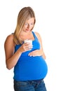 Pregnant woman with glass of milk Royalty Free Stock Photo