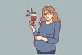 Pregnant woman with glass of wine drinks alcohol unknowingly causing harm to unborn child