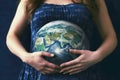 Pregnant woman with a globe instead of a belly. The idea of awakening motherhood, caring for the balance of the Earth