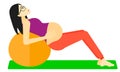 Pregnant woman on gymnastic ball.