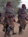 Pregnant woman from the Hamar tribe chants and dances during the bull jumping ceremony