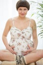 Pregnant woman having cold feet Royalty Free Stock Photo