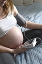 Pregnant woman having her blood pressure checked Royalty Free Stock Photo
