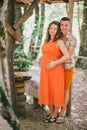 Pregnant woman having lunch with her husband in a forest Royalty Free Stock Photo