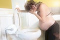 Pregnant woman having morning sickness during