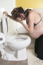 Pregnant woman having morning sickness during Royalty Free Stock Photo