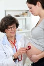 Pregnant woman at her gynaecologist. Royalty Free Stock Photo