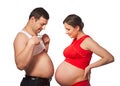 Pregnant woman and her husband with big belly Royalty Free Stock Photo