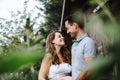 pregnant woman and her husband sharing some joyful moments