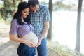 Pregnant woman with her husband waiting for newborn baby. Royalty Free Stock Photo