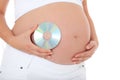 Pregnant woman holding dvd Royalty Free Stock Photo
