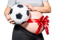 Pregnant woman holding football. expecting a boy Royalty Free Stock Photo