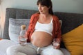 Pregnant woman drinking water Royalty Free Stock Photo