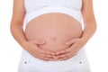 Pregnant woman holding her baby bump Royalty Free Stock Photo