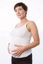 Pregnant woman holding her bump Royalty Free Stock Photo