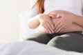 Pregnant Woman holding her hands in a heart shape on her Belly Royalty Free Stock Photo