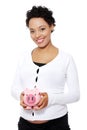 Pregnant woman holding piggy bank Royalty Free Stock Photo