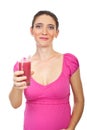 Pregnant woman holding strawberry juice Royalty Free Stock Photo