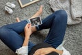 Pregnant woman holding an ultrasound image of the baby in utero, Young mother expecting a baby Royalty Free Stock Photo