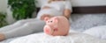 A pregnant woman holds a pig bank in her hands. Selective focus Royalty Free Stock Photo