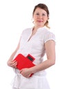 Pregnant woman holds red balance Royalty Free Stock Photo