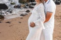 Pregnant woman hugging her husband Royalty Free Stock Photo