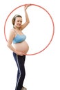 Pregnant woman and hula hoop Royalty Free Stock Photo