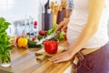 Pregnant woman with insuline pump preparing healthy food Royalty Free Stock Photo