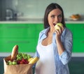 Pregnant woman in the kitchen Royalty Free Stock Photo