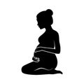 Pregnant kneeling woman black silhouette icon vector Royalty Free Stock Photo