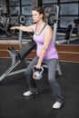 Pregnant woman lifting kettlebell Royalty Free Stock Photo