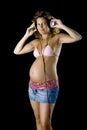 Pregnant woman listen music Royalty Free Stock Photo