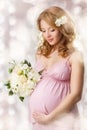 Pregnant woman looking at belly Royalty Free Stock Photo