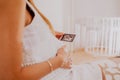 Pregnant woman looking at her baby twins sonography. Happy expectant mother enjoying first photo of her kids, face is Royalty Free Stock Photo